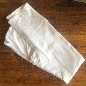White Lululemon high waisted eyelet leggings